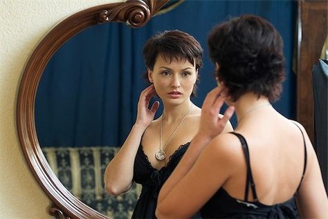 Woman Looking Into Mirror, Looking Into Mirror, Mirror Drawings, Mirror Photography, Facial Rejuvenation, Gain Confidence, How To Gain, Human Poses Reference, Woman Looking