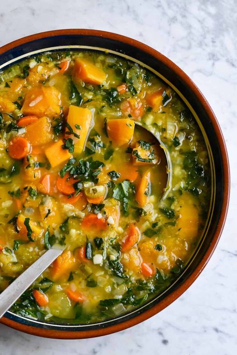 This immune boosting butternut squash vegetable soup has a variety of tastes and textures guaranteed to strengthen your body from the inside out. It's a hearty soup made with creamy butternut squash, antioxidant rich cauliflower rice and nutrient dense kale but completely grain and gluten free. Herbs and spices enhance the flavor of the vegetables and boost your overall health. Butternut Squash Stew, Butternut Squash Soup Recipe, Fasting Recipes, Creamy Butternut Squash, Butternut Soup, Hearty Vegetable Soup, Squash Vegetable, Butternut Squash Recipes Soup, Healthy Soups