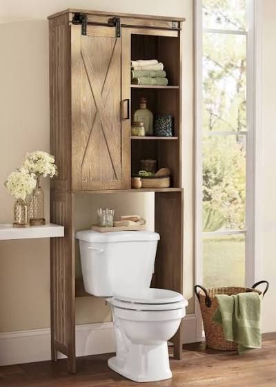 Behind Toilet Storage, Shelves Behind Toilet, Behind Toilet, Bathroom Storage Over Toilet, Over The Toilet Ladder, Clever Bathroom Storage, Barn Door Cabinet, Leaning Shelf, Bathroom Space Saver