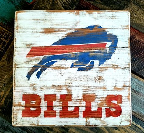 This a rustic and distressed wooden Buffalo Bills sign. It measures 18x18 inches.Perfect gift for the super fan Buffalo Bills Cake, Buffalo Bills Nails, Buffalo Bills Stuff, Buffalo Bills Gifts, Buffalo Bills Logo, Bills Logo, Flag Painting, Wooden Flag, Reclaimed Wood Projects