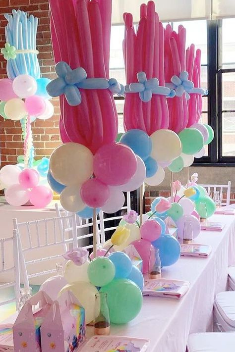 Don't miss this colorful Trolls themed birthday party! The balloon centrepieces are wonderful! See more party ideas and share yours at Catchmyparty.com #catchmyparty #partyideas #trolls #trollsparty #girlbirthdayparty Girls Trolls Birthday Party, Trolls Birthday Party Outfit, Trolls First Birthday Party Ideas, Trolls 2 Birthday Party Ideas, Trolls Poppy Birthday Party Ideas, Trolls Candy Table Ideas, Trolls Birthday Party Ideas Decorations Centerpieces, Trolls Birthday Centerpieces, Trolls Theme Party