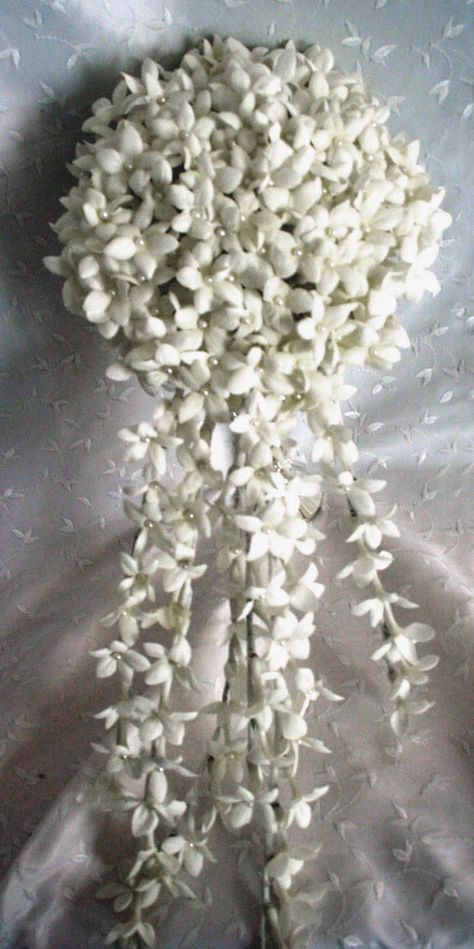 Jessica simpson wedding bouquet Stephanotis Wedding Bouquet, Jessica Simpson Wedding, Jasmine Bridal, Cascading Wedding Bouquets, Summer Wedding Bouquets, Wedding Diary, Teal Wedding, Cascade Bouquet, Wonderland Wedding