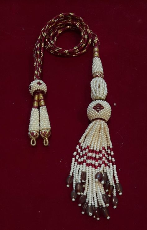 Generally used in Necklace Making Fully Handmade Necklace Cord Beaded Tassel Cord And Knob Great for jewelry making Size: 15-16 Inches We do take wholesale orders with affordable discounts Do what's app for further queries on +918094433355 Traditional Adjustable Kundan Necklace With Latkans, Ceremonial Festive Necklace With Latkans, Dori Tassels, Spiritual Necklace With Latkans And Round Beads, Traditional Handmade Adjustable Tassel Necklace, Maroon Necklace, Fancy Necklace, Indian Necklace, Necklace Online