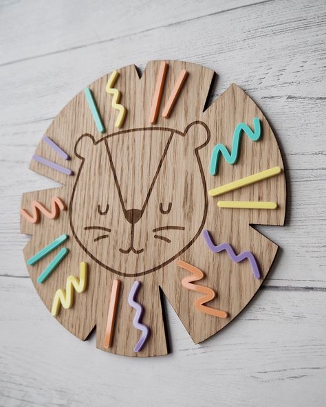 Rory the Lion is a story about a young lion who must find his courage to face a bully and protect his pride. Along the way, he learns the importance of friendship, teamwork, and.#lasercutclock #walldecor #homedecor #modernclock #uniqueclock Lion Nursery, Safari Decor, Safari Decorations, Animal Safari, Laser Cut Wood Crafts, Wooden Wall Plaques, Laser Projects, Laser Ideas, Cute Lion