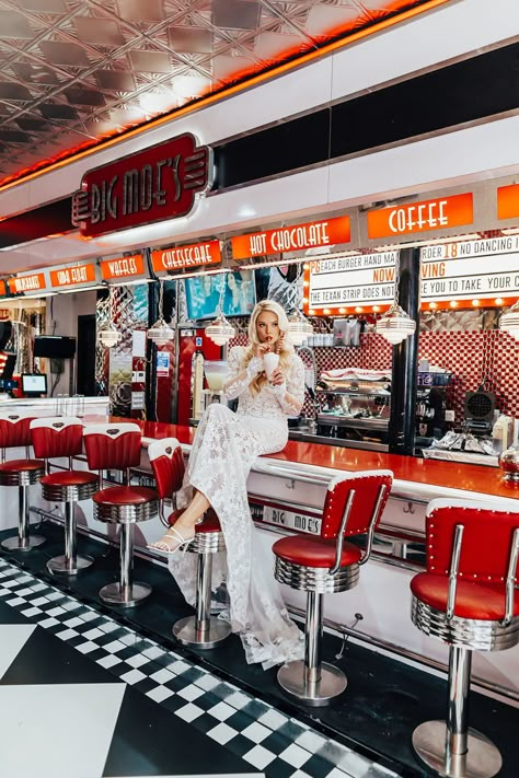 Retro diner wedding photoshoot, diner couple photoshoot, Berta wedding dress, American 50's diner couple shoot, Hollywood waves bride hairstyle, Berta Gown, Diner fashion photoshoot Diner Wedding, Diner Photoshoot, 50s Photoshoot, American Diners, Carpenter Photography, Diner Aesthetic, American Cafe, Retro Photoshoot, Chicken Restaurant