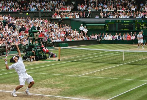 Roger Federer serves to Andy Roddick during the 2005 Wimbledon final. Wimbledon Final, Andy Roddick, Roger Federer, Room Posters, Wimbledon