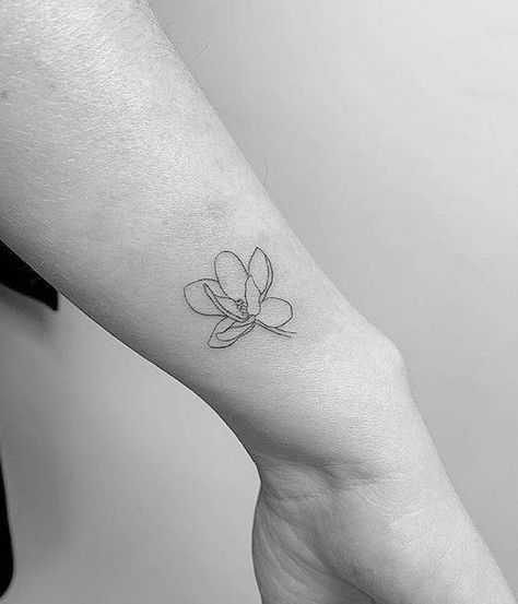 Magnolia tattoo on the wrist. Magnolia Flower Tattoo, Magnolia Tattoo, Orchid Tattoo, Petite Tattoos, Line Art Tattoos, Dainty Tattoos, Mom Tattoos, Feminine Tattoos, Nature Tattoos