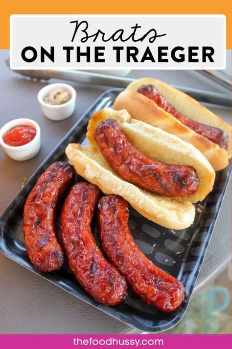 Making Brats on the Traeger is a delicious cookout lunch anytime! Cooking them a little more slowly than on the grill turns them a beautiful dark color and infuses your brats with a smoky amazing flavor! via @foodhussy Brats On Smoker, Brats On The Traeger, Brats On Pellet Grill, Smoked Brats Pellet Grill, Pineapple Brat, Smoked Brats, Traeger Chicken, Smoker Grill Recipes, How To Cook Brats