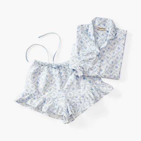 These airy and lightweight pajamas are perfect for wearing all year round. The ruffled trim and botanical motif are colorful and charming, while breathable cotton sateen keeps you feeling comfy during sleep. Designed exclusively for Pottery Barn Teen by lifestyle brand LoveShackFancy. KEY PRODUCT POINTS By choosing our cotton products, you're supporting our investment in Better Cotton's mission. This product is sourced via mass balance and therefore may not contain Better Cotton. Learn more at b Coastal Pajama Set, Light Blue Pajama Set, Cute Teen Pajamas, Pajama Shorts Set, Hollister Pjs, Roller Rabbit Pjs, Fancy Pottery, Preppy Pjs, Pajama Set Summer