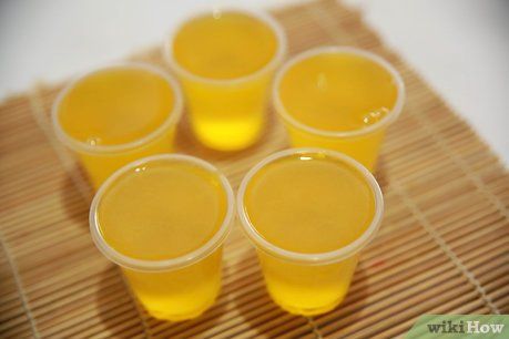 Image titled Make Island Pineapple Coconut Jello Shots Step 4 Malibu Rum And Pineapple Juice, Coconut Jello Shots, Hawaiian Jello Shots, Jolly Rancher Jello, Coconut Jello, Blue Hawaiian Jello Shots, Jello Shot Cups, Pineapple Jello, Jello Pudding Shots