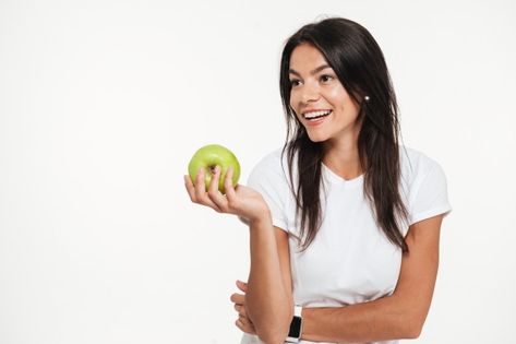 Hand Held Food, Holding Fruit, Black And White Photography Portraits, Sugar Free Drinks, Fruits Drawing, Fit Woman, Brunette Woman, Standing Poses, Green Apple