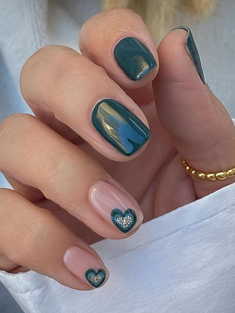 st.patrick's day nails: dark green short nails with a heart Nails For March And April, Neutral March Nails, Nail Ideas St Patricks Day, Feb March Nails, Nail For March, Gel Nails March 2024, St Paddys Day Nails Simple, Simple Saint Patricks Day Nails Gel, March Bday Nails