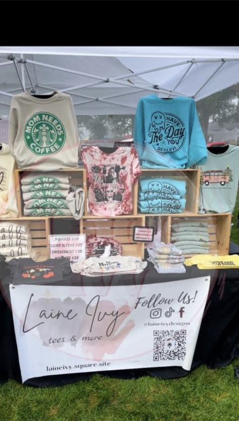 Tshirts Display Ideas, How To Set Up A Shirt Booth, Vendor T Shirt Display, Best Vendor Booth Displays, How To Display Shirts For Sale Craft Fairs, Clothes Display Ideas Booth, Shirt Vendor Booth Display Ideas, Pop Up Shop Display Ideas Craft Booths, Onesie Display Craft Fairs