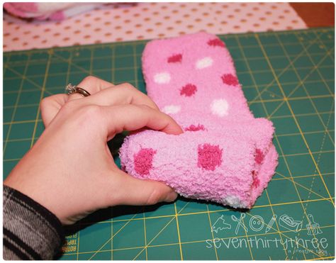 Sock Cupcake Tutorial - seven thirty three Diy Fuzzy Sock Cupcakes, Sock Cupcakes Christmas, Gift Wrap Socks Ideas, Wrapping Socks For Christmas, How To Wrap Socks As A Gift Cute Ideas, Cupcake Socks How To Make, Cupcake Socks Diy, Sock Cupcakes Diy, Sock Cupcakes Diy How To Make