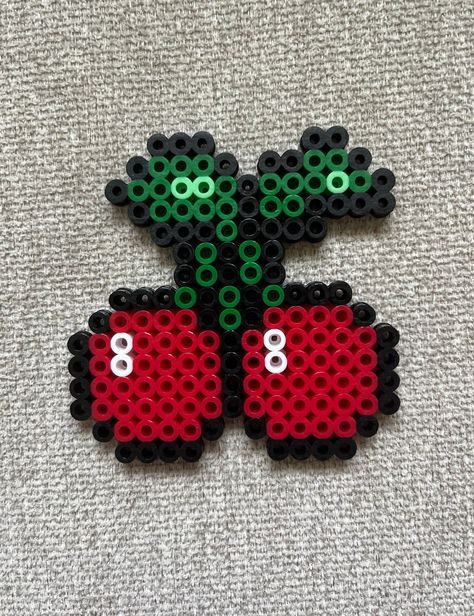 Cherry perler bead magnet made with red, green, black and white beads. Teacher Perler Bead Patterns, Lava Lamp Perler Beads, Small Perler Bead Patterns, Melting Beads Ideas, Cute Perler Bead Patterns, Perler Bead Christmas, Fuse Beads Ideas, Pearl Ideas, Melty Bead Designs