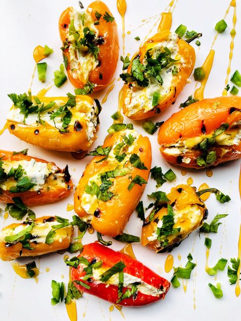 Goat cheese stuffed mini peppers with hot honey – Burrata & Bhaturas Hot Honey Recipe, Mini Sweet Peppers, Grilled Peppers, Cheese Stuffed Peppers, Stuffed Mini Peppers, Fresh Salad Recipes, Charcuterie And Cheese Board, Recipes Appetizers And Snacks, Honey Recipes