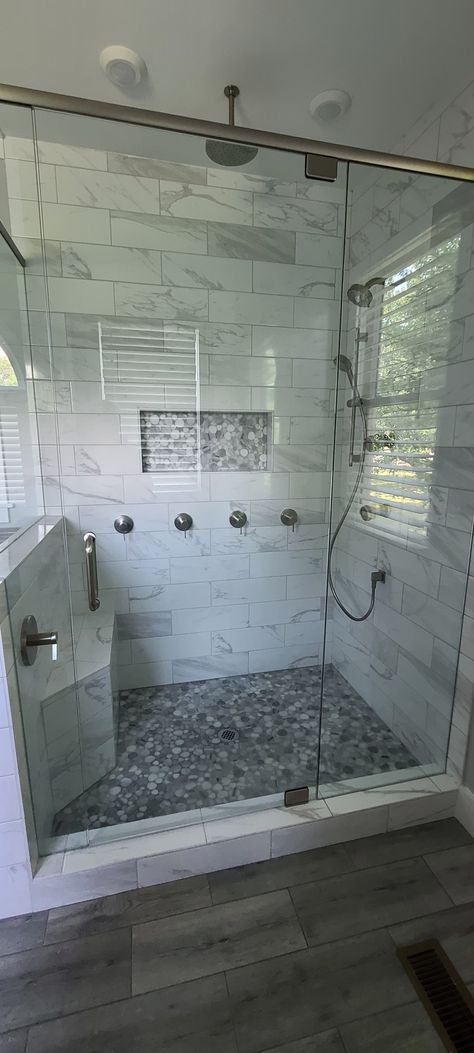 Shower Tile Ideas 1x2, Floor Shower Tile Ideas, Master Shower Remodel Tile, Pebble Wall Tiles Bathroom, Marble Pebble Floor, Shower Tile With Pebble Floor, Bathroom With Marble Shower Walls, Marble Pebble Shower Floor, Shower Floor Tiles Ideas