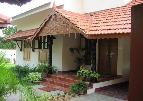 Architecture and interior design projects in India - Tarawad - Benny Kuriakose - Kerala Tile Roof House, Chettinad House Entrance, Front House Arch Design, Traditional Roof Design, Traditional House Elevation Design, Traditional Kerala House Elevation, Kerala Roof Design, Kerla Design House, House Roof Design Exterior