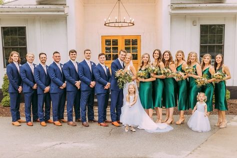 Emerald And Navy Blue Wedding, Emerald Green Bridesmaid Dresses And Navy Blue Suits, Royal Blue Emerald Green Wedding, Navy Suit Green Dress, Blue Suit Green Dress, Emerald Green And Royal Blue Wedding, Royal Blue And Emerald Green Wedding, Emerald Bridesmaid Dress With Groomsmen, Emerald Wedding Color Schemes