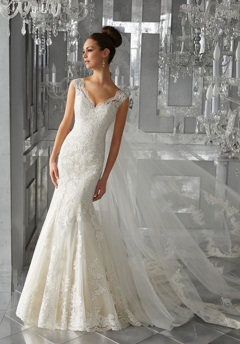 Classic and Elegant, This Soft Net Fit and Flare Wedding Dress Features Frosted, Embroidered Appliqués and Scalloped Hemline. An Intricately Embroidered Illusion Back Completes the Look. Shown with Detachable Tulle Train, Sold Separately as Style#11272. Available in Three Lengths: 55", 58", 61". Colors Available: White, Ivory, Ivory/Light Gold. Shown in Ivory/Light Gold. Black Tie Dress Wedding, Mori Lee Bridal, Mori Lee Wedding Dress, Wedding Dresses 2018, Fit And Flare Wedding Dress, Womens Prom Dresses, Designer Bridal Gowns, Mori Lee, Bridesmaid Dress Sizes