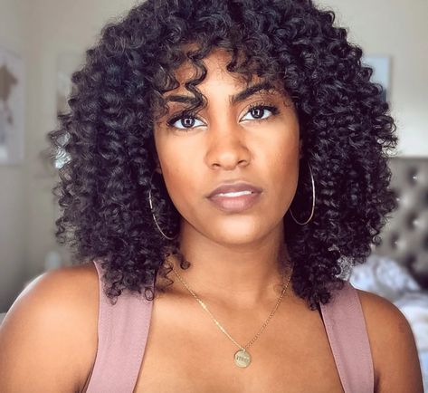 43 Cute Natural Hairstyles That Are Easy to Do at Home | Glamour Perm Black Hair, Twists With Bangs, Black Hair At Home, 2c Hair, Natural Hair Pictures, Bun With Curls, Hair Shrinkage, Natural Updo, Medium Length Haircuts