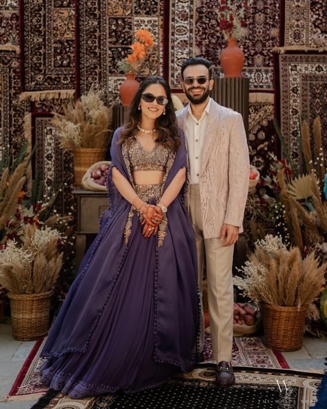 Creating the perfect setting for Sharvi and Ishaan’s mehendi was such a joy. So happy to be part of their beautiful journey. Bride- @sharvidubey Groom- @ishaankataria Decor & Design- @decorbykomal Beautiful photos- @thewhitebox.in #alsisarmahal #alsisarnahargarh #nahargarhwedding #alsisarmahal #decorbykomal #inspiredesign #weddingdecoration #shaadisaga #decorbykomal #decorationinspo #indianwedding #luxurywedding #grandwedding #goaweddingplanner #goaweddingdecor #weddingdecorator #wedding... Purple Couple Outfits Indian, Mehendi Outfits For Bride And Groom, Couple Indian Outfits, Groom Engagement Outfit Indian, Mehendi Dress Outfits, Engagement Outfits Indian Couple, Engagement Outfits Indian, S Mehendi, Mehendi Outfits For Bride