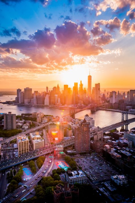 sunset new york city manhattan district air Wallpaper Of New York, Sunset In Nyc, New York City Sunset, Brazil Cities, New York Sunset, Sunrise City, Newyork Manhattan, Sunrise Colors, City Sunset