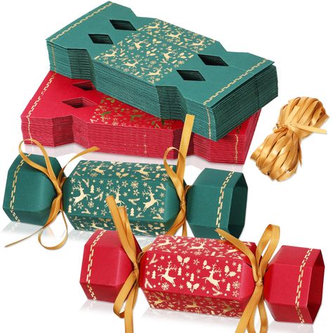 PRICES MAY VARY. Package Content: you will receive 50 pieces of unfolded Christmas crackers and matching ribbons with 2 different color patterns, 25 pieces for each pattern; The single size of these Christmas crackers is about 7.3 x 1.9 x 1.9 inch/ 18.5 x 5 x 5 cm; Please note that our products are not folded, so you need to complete the folding after receiving the goods Christmas Themed Design: the snowflake and reindeer party cracker adopts Christmas themed elements, including elk, snowflakes,