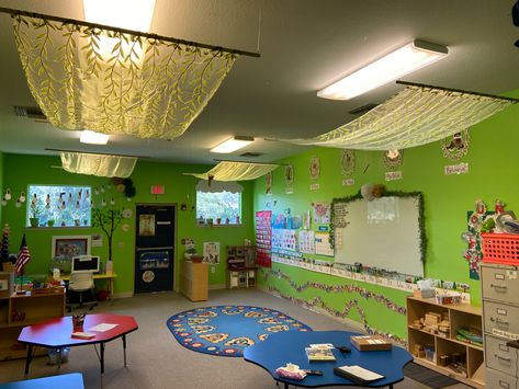 Fantasy Classroom, 3k Classroom, Nature Classroom, Green Accent Wall, Forest Classroom, Daycare Curriculum, Faux Wood Wall, Green Painted Walls, Preschool Decor