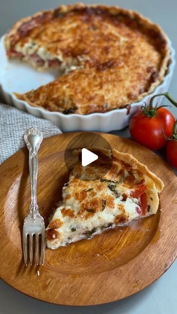 Alston Calabrese & Leigh Hansen on Instagram: "TOMATO BASIL TART 💫

1 refrigerated pie crust, cooked as directed 
2 cups of shredded mozzarella cheese (about 8 ounces)
4 medium or 5 Roma tomatoes, wedged and drained (or two large tomatoes, sliced and seeds removed)
4 cloves garlic, peeled and minced
1 cup fresh basil leaves, julienned (or roughly chopped)
1/2 cup mayonnaise 
1/4 cup grated Parmesan cheese
1/8 teaspoon white pepper

Lay wedges or sliced tomatoes out on a paper towel and lightly salt them. Let them drain while preparing the rest of the tart.

When pie crust comes out of the oven, sprinkle it with 1/2 cup of mozzarella and let cool.  Arrange tomato wedges/slices on cheese in pie shell, covering bottom of pie crust.  Sprinkle minced garlic then julienned/chopped basil on top Habitual Hostess, Tomato Basil Tart, Cherry Tomato Tart, Savoury Tarts, Sliced Tomatoes, Refrigerated Pie Crust, Tomato Season, Tomato Tart, Savory Tart