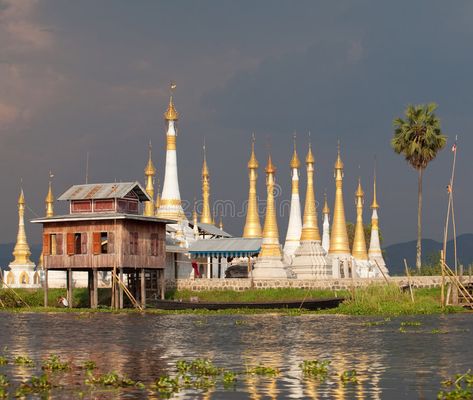 Inle Lake, Myanmar. Pagodas of a temple in the evening sun on the border of Inle #Sponsored , #sponsored, #AD, #Lake, #Pagodas, #sun, #Myanmar Inle Lake Myanmar, Gurudongmar Lake Photography, ရွေတိဂုံဘုရား Photo, Myanmar Landscape, Myanmar Beautiful Place Inlay, Inlay Lake, Real References, Inlay Lake Myanmar, Inle Lake