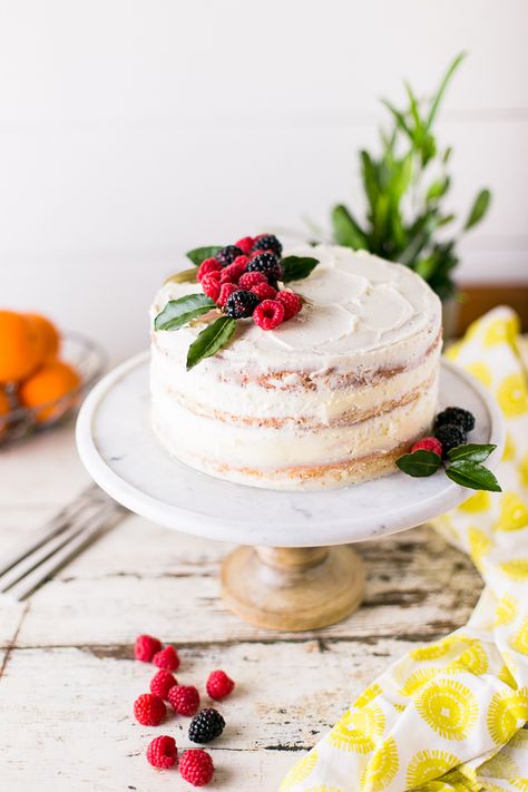 A delicious white cake recipe that is easy to bake and assemble. The addition of jam between the layers makes this the perfect Holiday cake recipe. #foodblogger #cakerecipe #scratchcake #baking Cake With Jam, Mayonnaise Cake, Holiday Cake, Sour Cream Cake, Cake Recipes From Scratch, Rustic Cake, Sweet Cake, Tampa Wedding, Box Cake Mix