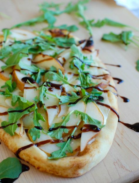 Warm Pear Brie Arugula Naan is the perfect holiday appetizer that will impress your guests. This beautiful flatbread is warmed in the oven with brie cheese and pear and then topped with arugula and a drizzle of balsamic glaze.  // A Cedar Spoon Brie Flatbread, Pear Brie, Naan Pizza, Amigurumi For Beginners, Holiday Appetizer, Best Appetizer Recipes, Flatbread Recipes, Brie Cheese, Holiday Appetizers