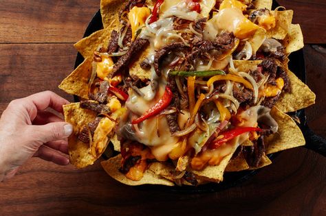 Steak Nachos Easy, Cheesesteak Nachos Recipe, Loaded Nachos Recipe Beef Tortilla Chips, Philly Cheesteak Skillet, Steak Nachos, Campbell's Fiesta Nacho Cheese Recipes, Cheez Whiz, Philly Steak, Cheez It