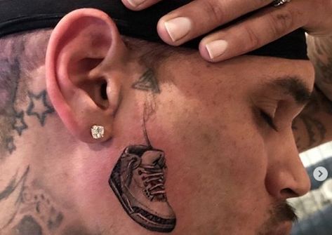 Chris Brown Face Tattoo, Chris Brown Inspired Tattoos, Chris Brown Tattoo Ideas, Jordan Tattoo Ideas, Chris Brown Tattoos, Tattoos In The Workplace, Nike Tattoo, Jordan Tattoo, British Tattoo