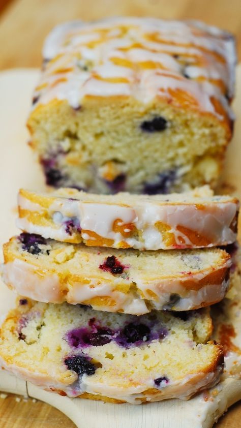 Blueberry vanilla bread with lemon glaze. This delicious bread is stuffed with blueberries, and deliciously flavored with vanilla and lemon zest. Moist Lemon Blueberry Bread, Moist Lemon Blueberry Loaf, Blueberry Lemon Loaf Recipe, Lemon Blueberry Loaf With Lemon Glaze, Blueberry And Lemon Loaf, Healthy Lemon Loaf, Blueberry Loaf Bread, Breakfast Baked Goods, Lemon Blueberry Bread Recipe