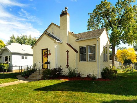 The house may have a little footprint (just over 850 square feet), but it's made from solid stucco construction. A quaint peaked roof gives it even more personality. Small House Colors, Old World Home, Bungalow Homes, Tiny Cottage, House Color Schemes, Architecture Model Making, Home Exterior, White Brick, Home Building Design