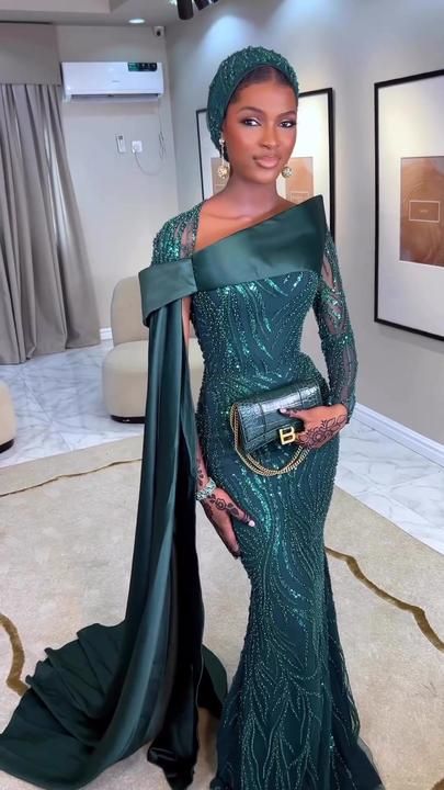 Modest Fashion on TikTok Modest Asoebi Lace Styles, Traditional Couple, Asoebi Lace Styles, Nigerian Dress Styles, Nigerian Wedding Dress, Nigerian Dress, Gold Lace Dresses, African Blouses, Green Wedding Dresses