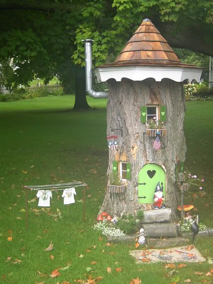 A little bit ago I posted pics of a Gnome house that was built in a tree stump. The other day I took a couple other photos. I thought that if anyone was inspired to do something similar, or at least just wanted to see how it was updated recently would want to see this.   I… Gnome Home Tree Stump, Gnome Houses, Stump Ideas, Fairy Tree Houses, Gnome Home, Fairy Gnome, Tree Stumps, Fairy Homes, Faeries Gardens