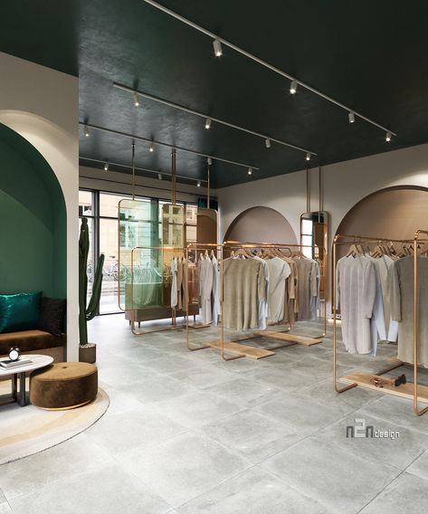 CLOTHING STORE - VN - 2021 on Behance Clothing Office Design, Clothing Design Store, Fashion Showroom Design, Clothes Store Ideas Design, Modern Clothing Store, Green Boutique Interior, Boutique Store Design Interiors, Designer Boutique, Shop Store Design