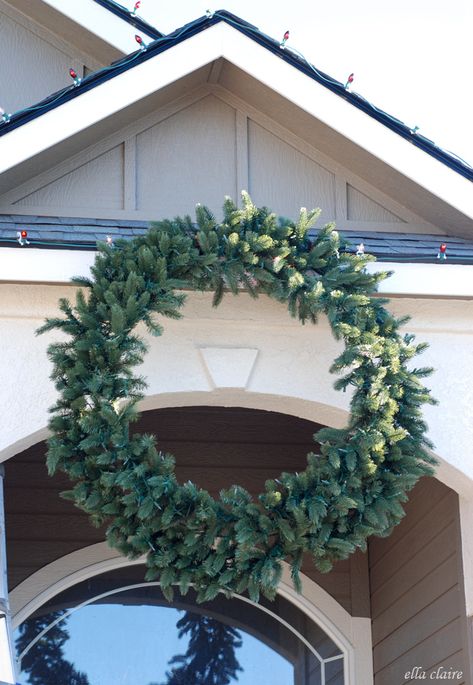 I am so excited to share this beautiful find from Balsam Hill with you today. I am such a big fan of their beautiful trees and wreaths and am thankful for their sponsorship of this post. The thoughts and tutorial are my own. I have always loved Christmas lights, but having a toddler makes me love them...Read More » Large Outside Wreath, Wreath Over Garage Door, Large Outside Christmas Wreaths, Giant Christmas Wreath On House, Giant Outdoor Christmas Wreath, Diy Giant Christmas Wreath, Large Christmas Wreath Outdoor, Large Outdoor Wreath On House, Giant Christmas Wreath Frame