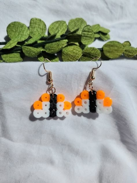 Cute sushi earrings for your sushi-obsessed friends and family!  This product is made of Hama beads, which are small plastic beads that can be ironed into different shapes and designs.  Made in Edinburgh, Scotland Melt Bead Earrings, Tiny Hama Bead Designs, Perler Beads Sushi, Peeler Bead Earring Ideas, Peeler Bead Ideas Small Easy, Small Hama Bead Designs, Iron Beads Ideas Cute, Cute Hama Beads, Mini Perler Bead Patterns