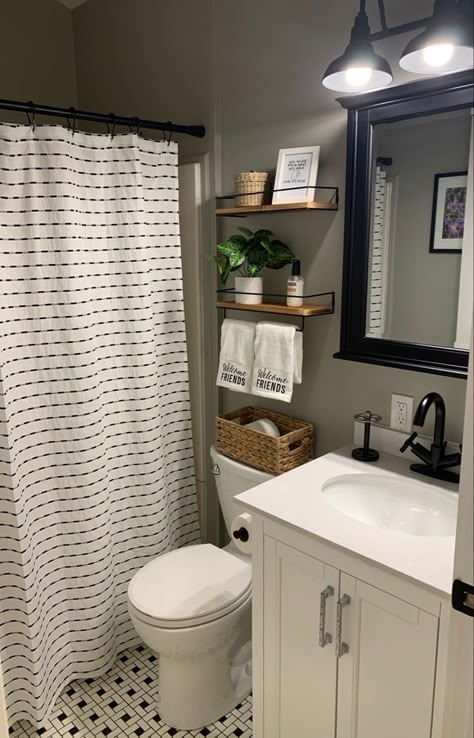 Eucalyptus Theme Bathroom, Wallpaper In Guest Bathroom, Bathroom Decor Black And White Tile, Small Guest Bathroom Ideas Farmhouse, Apartment Bathroom Decor Ideas Vintage, Apartment Bathroom Decor Ideas Boho, Small Bathroom Theme Ideas, Small Bathroom Ideas No Window, Small Restroom Decor Ideas