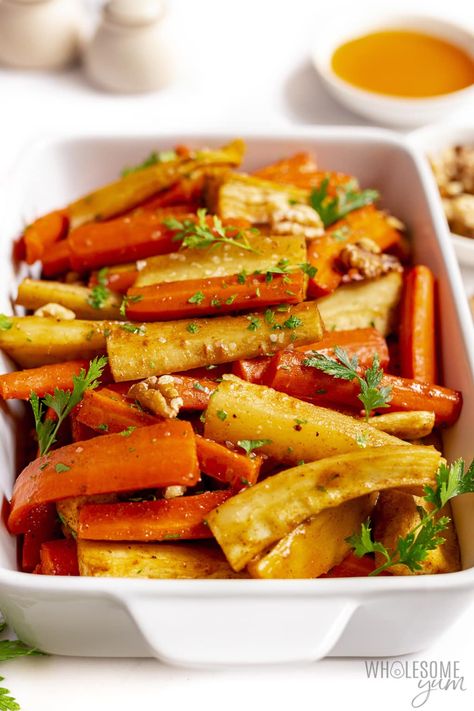 Roasted Carrots and Parsnips (So Easy!) - Wholesome Yum Roasted Carrots For Christmas, Roasted Carrot And Parsnip, Carrots Parsnips Roasted, Carrot And Parsnip Roasted, Roasted Parsnips Oven, Parsnips And Carrots Recipe, Roast Carrots And Parsnips, Roasted Carrots And Parsnips Recipe, Roast Parsnips And Carrots