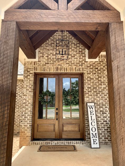 Stained Wooden Front Doors, Stained Beams Front Porch, Special Walnut Door Stain, Porch Beam Stain Colors, Walnut Door Exterior, Oak Patio Doors, Stain For Cedar Beams, Wood Beam Front Porch, Cedar Beams Porch