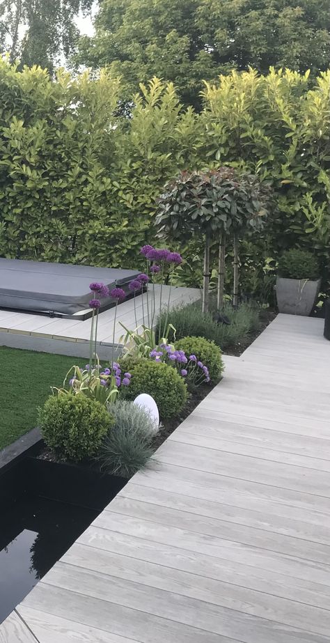 Millboard Decking Smoked Oak Smoked Oak Millboard Decking, Composite Decking Raised Garden Bed, Modwood Decking Silver Gum, Millboard Decking, Decking Ideas, Small Garden Design, Yard Ideas, Small Garden, House Exterior