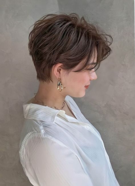 Trendy Pixie Haircut Ideas for 2024: Longer, Short, Red, and More Pixie Haircut With Highlights, Feminine Pixie Haircut Fine Hair, Pixie Haircut Color, Trendy Pixie Haircut, Blonde Long Layers, Red Pixie Haircut, Pixie Shag, Brown Pixie Cut, Pixie Haircut Fine Hair