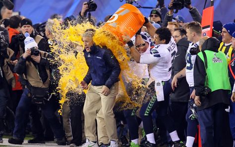 Organge crush: Seahawks coach Pete Carroll is soaked in luminous energy drink, as tradition dictates, towards the end of the match Seahawks Super Bowl, Pete Carroll, Seattle Seahawks Football, Superbowl Champions, Seattle Sports, Seahawks Fans, Seahawks Football, Best Football Team, Nfl History