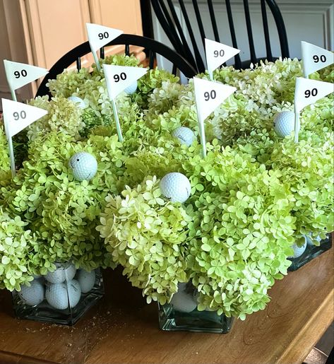 Birthday Centerpieces 1st, Golf Centerpiece Ideas Diy, Golf Ball Centerpieces, Golf Ball Decoration Ideas, Party Ideas For Senior Citizens, Masters Golf Party Centerpiece, Golf Balloon Garland, Golf Fundraiser Ideas, Golf Theme Centerpieces