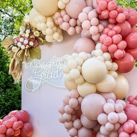 “Celebrating achievements with a touch of boho elegance! 🎓✨ This pink graduation setup by The Bashup Plan brings together joy and style for an unforgettable day. Which detail is your favorite 💕 Pink And White Balloon Arch, Pink Graduation Party Decorations, Girly Graduation Party, Summer Grad Party, Boho Graduation Party, Boho Graduation, Pink Graduation Party, Pink Graduation, Grad Party Decorations